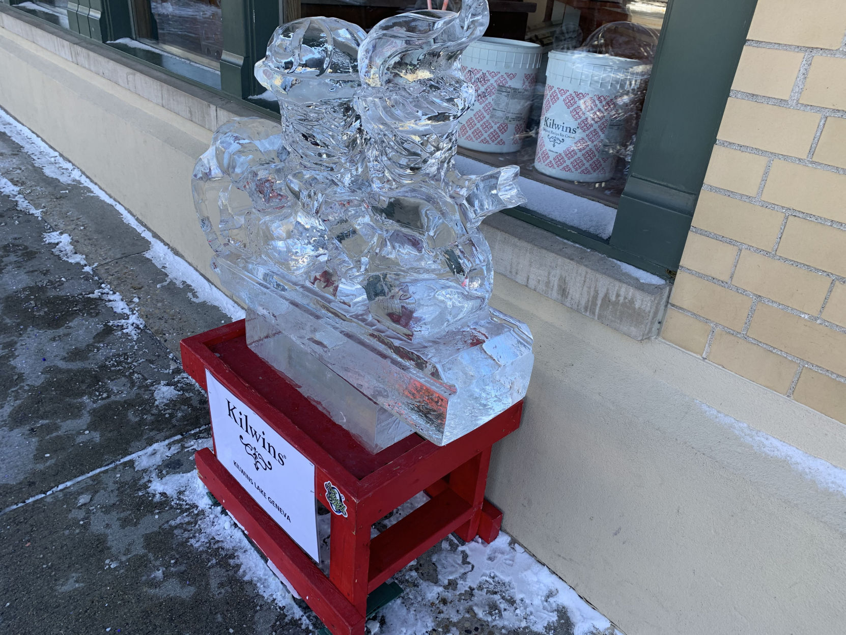 Kilwins of Lake Geneva had an ice sculpture depicting some ice cream treats outside of its business during Winterfest